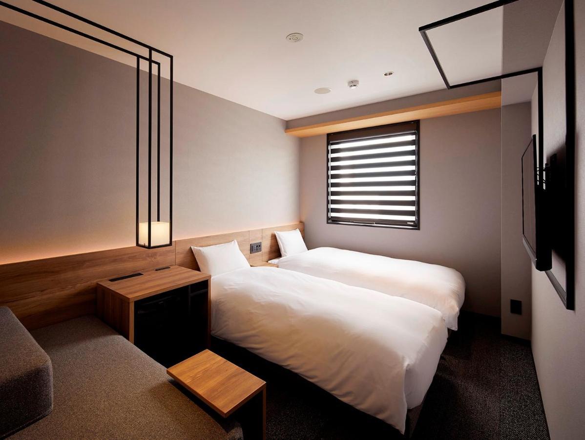 hotel androoms Shin-Osaka Buitenkant foto
