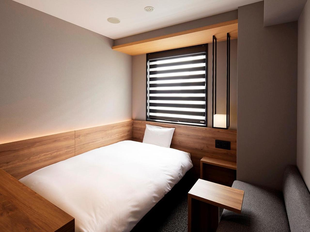hotel androoms Shin-Osaka Buitenkant foto